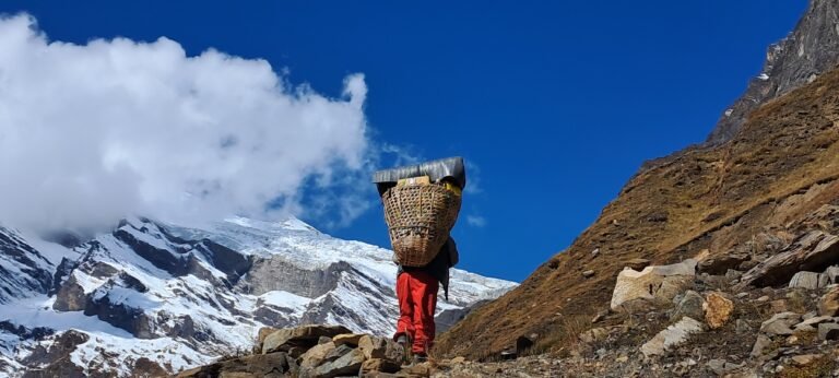 Camping trekking in Nepal it is adventure trip our porters carry about 25kg when they are going over 3000mtr .