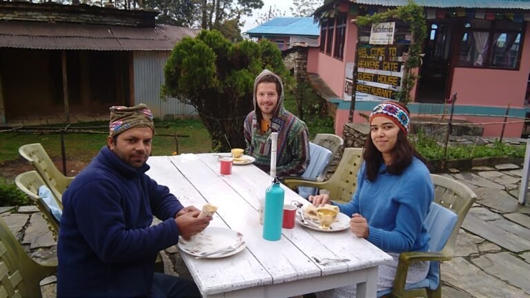 Tourists having breakfast in a tea house in Mardi Himal Trek